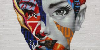 Audrey of Mulberry graffiti by Tristan Eaton on the wall of Cafe Roma in NY, USA